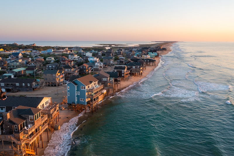 aerial view of Buxton, North Carolina shoreline and Hatteras Island at sunrise