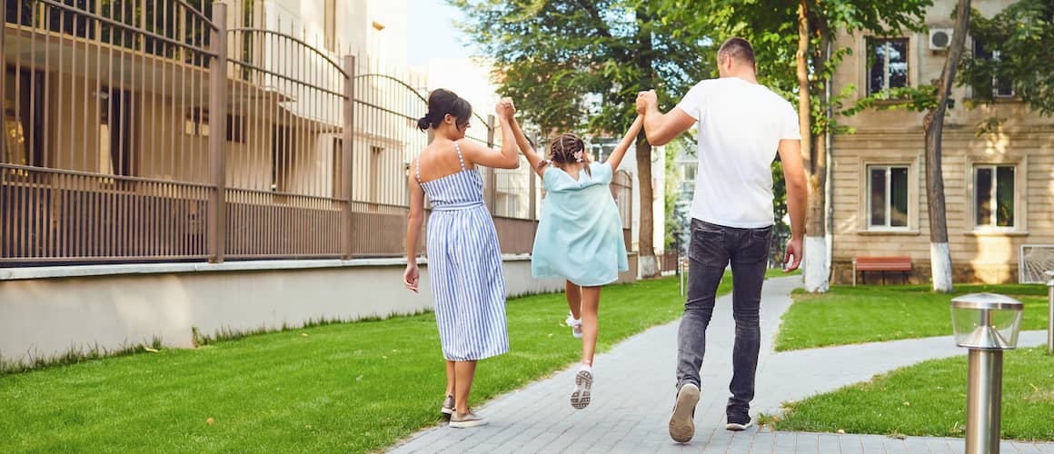 Happy family walking together.