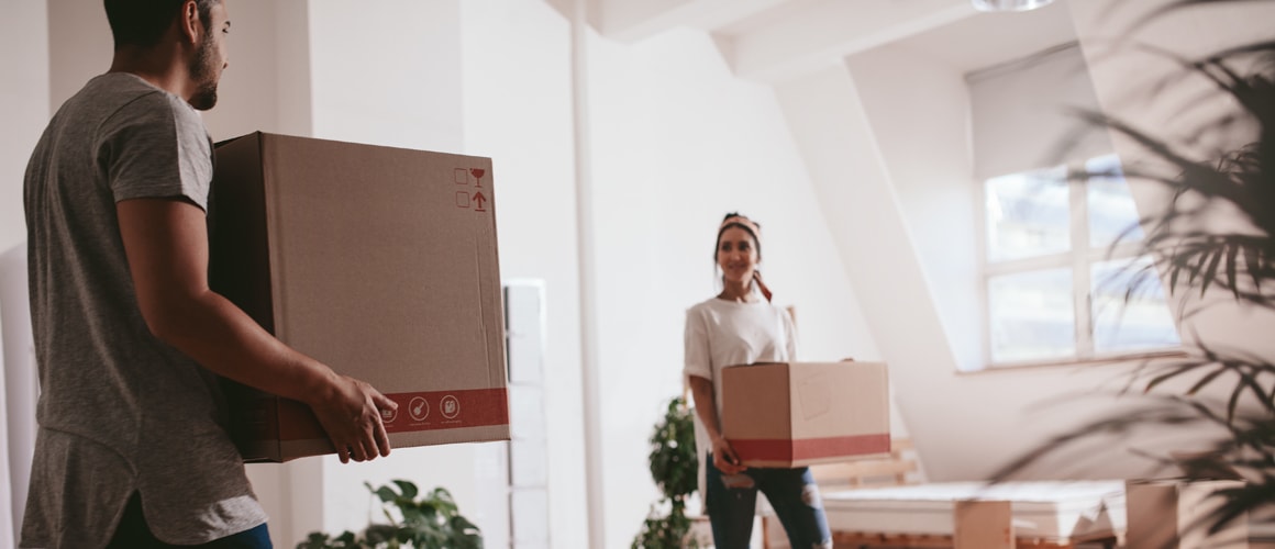 Couple with moving boxes