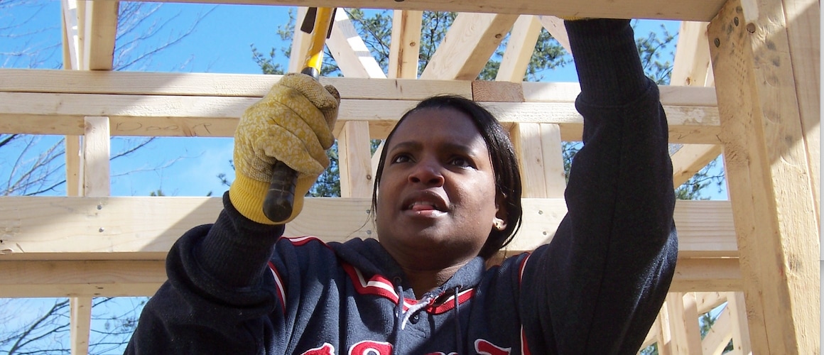woman building house