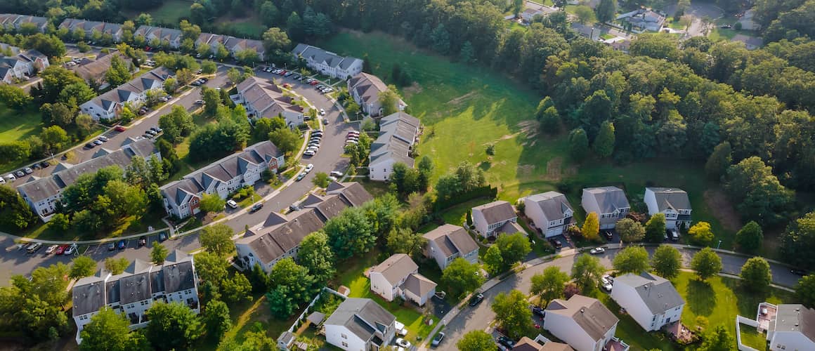 Aerial view of a small town at dawn.