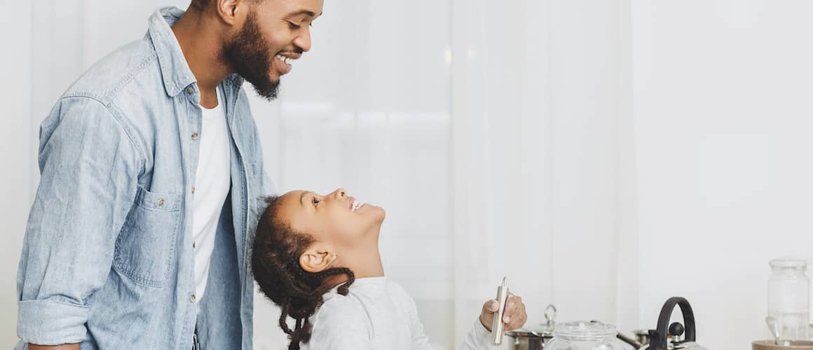 Father and daughter in home warranty covered new home
