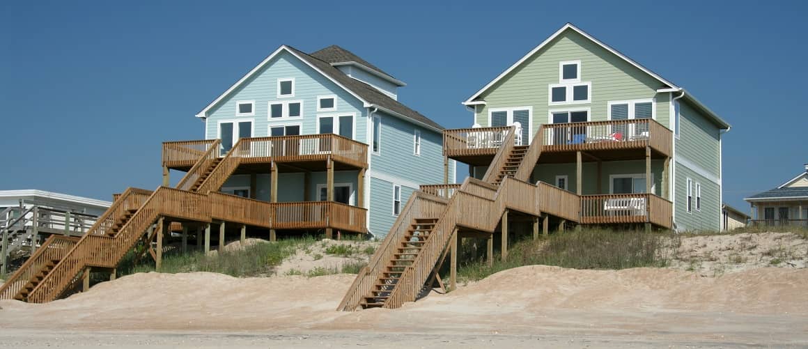 Beach front house against blue sky.