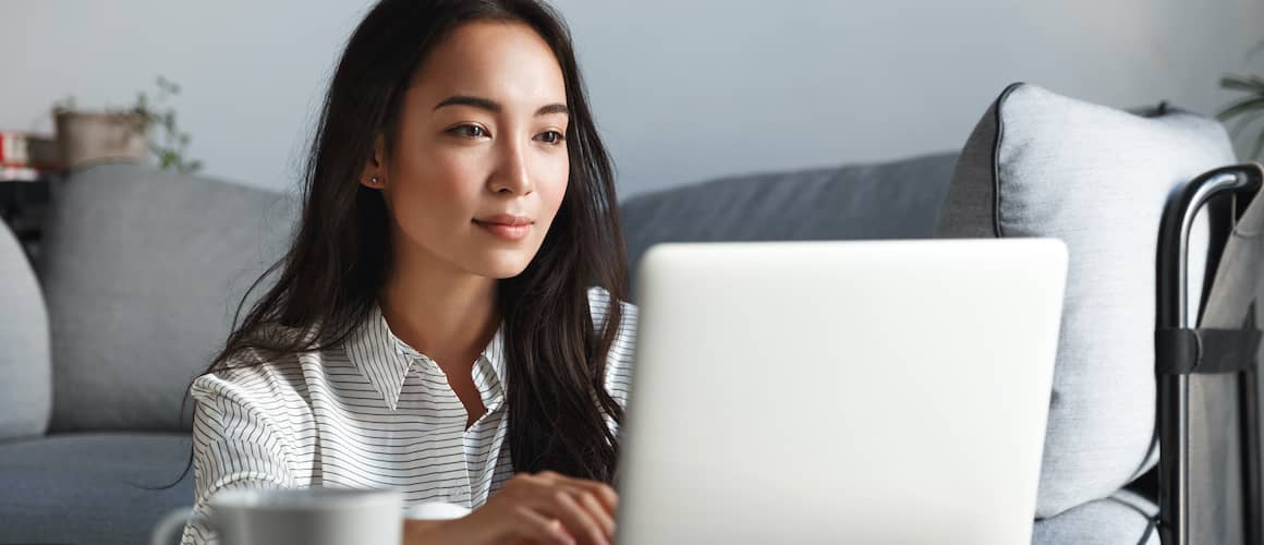 Woman requesting a C.L.U.E. Report online.