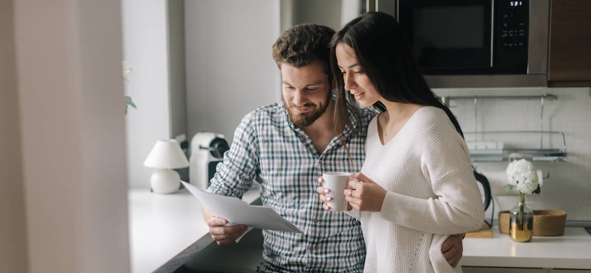 couple reading over documents
