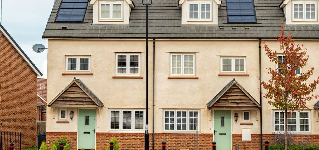 2 simple England townhomes in the fall