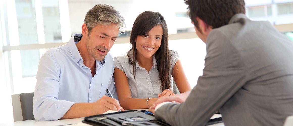 Discussing loan documents and signing.