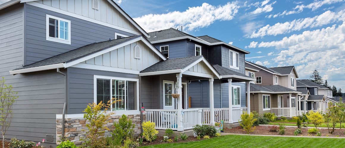 gray suburban houses in a neighborhood