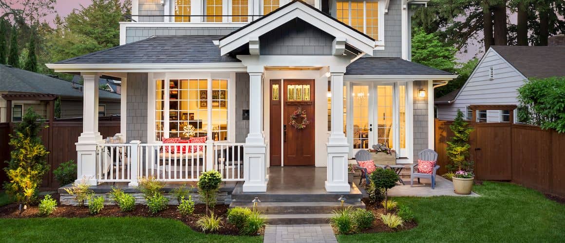 House with grey brick path.