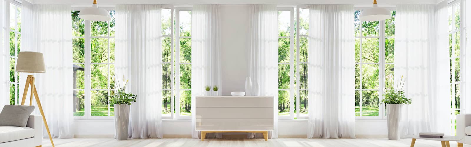 Interior of windowed Scandinavian styled white interior.