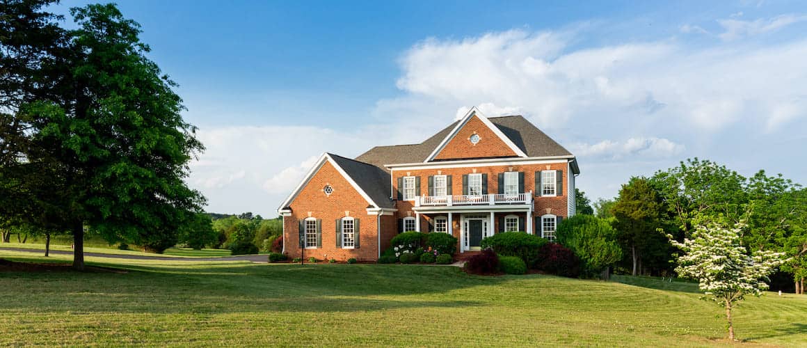 Brick Home With Expansive Green Lawn