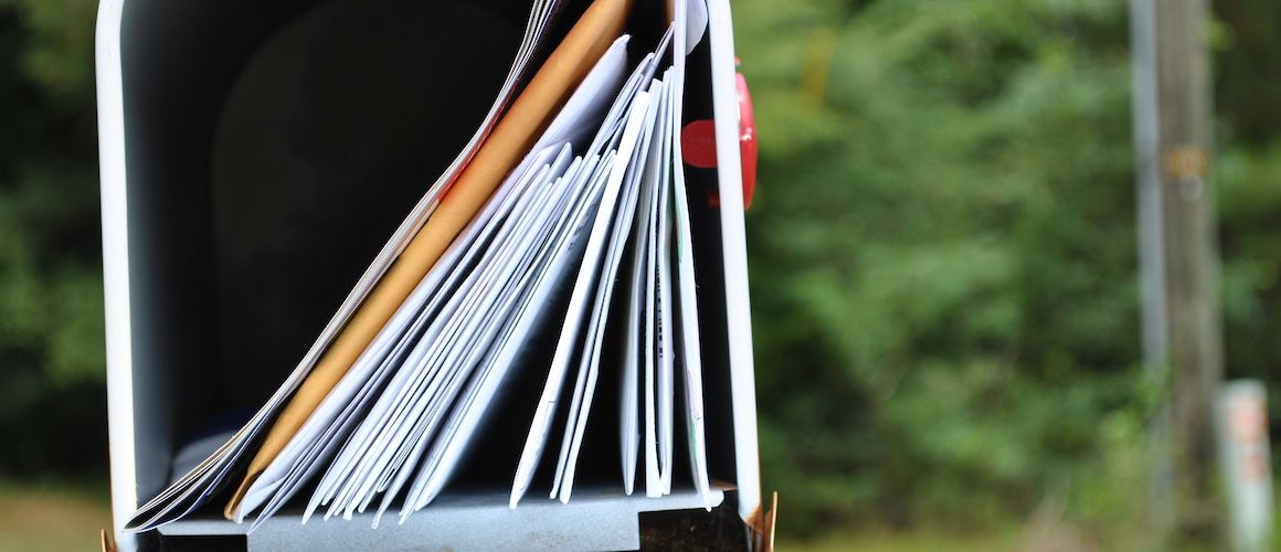 Mailbox full of junk mail.
