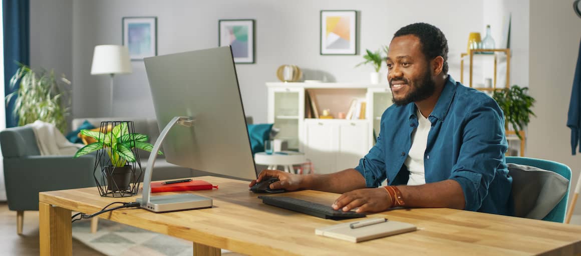 man working on a desktop