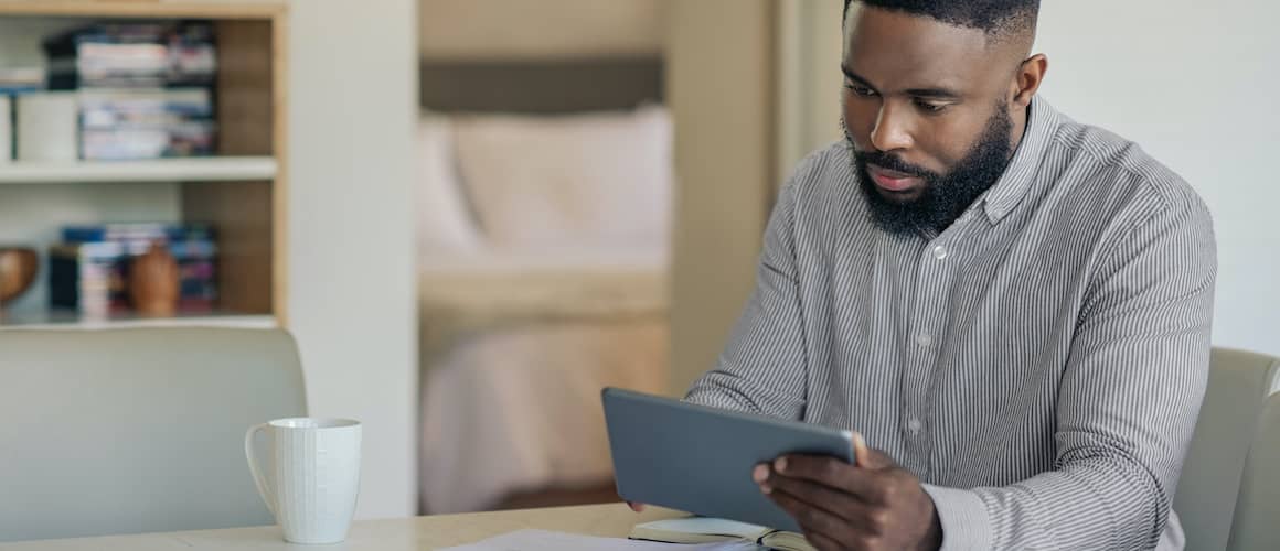 Man banking online at home.