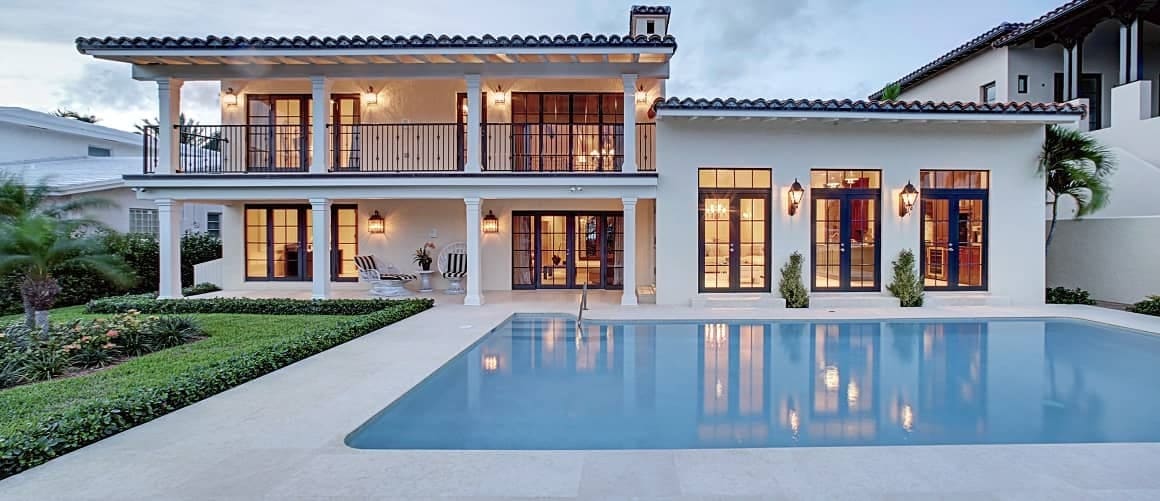 https://www.rocketmortgage.com/resources-cmsassets/RocketMortgage.com/Article_Images/Large_Images/Stock-Modern-House-With-Large-Pool-AdobeStock-127770833-Copy.jpg