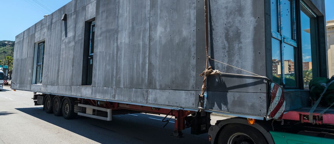 Modular home moving to final location.
