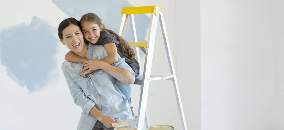 mom and daughter fixing up home
