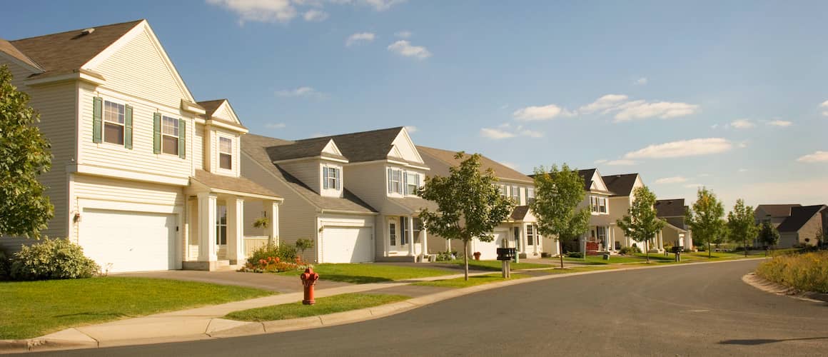 Suburban neighborhood with multiple similar family homes.
