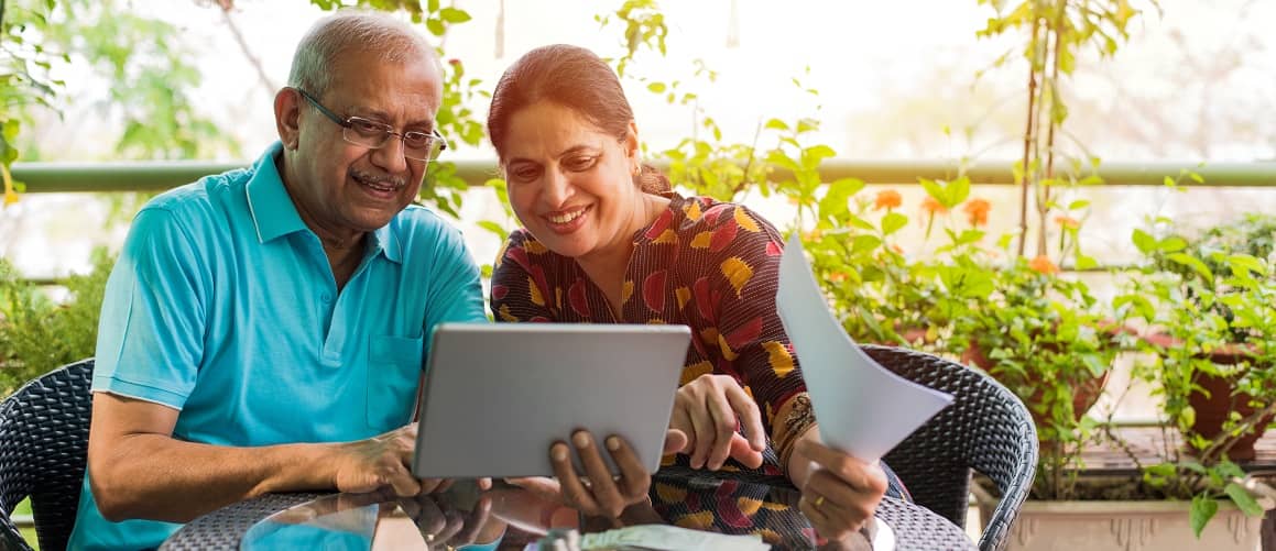 Older couple looking at papers.