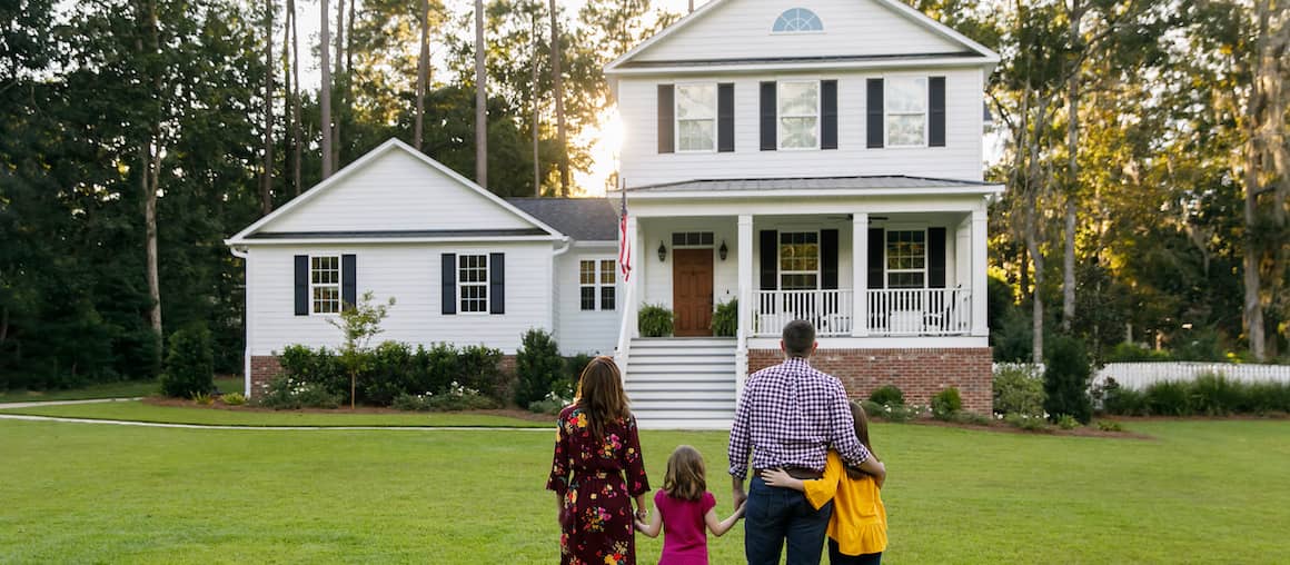 Family looking at home.