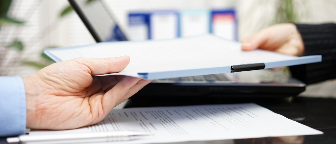 Paperwork transferring hands
