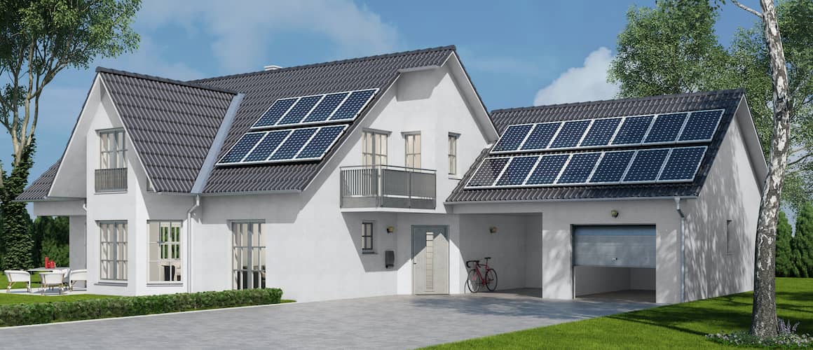 White Ranch home with solar panels.