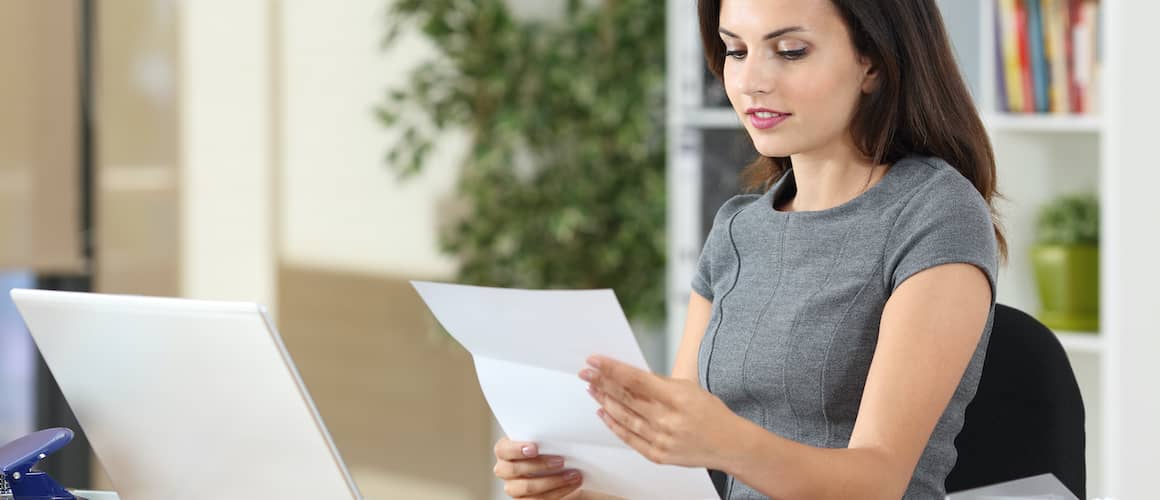 Woman filing papers.