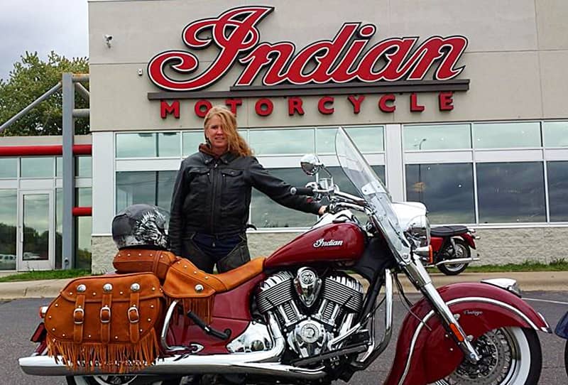 Mattie Murrey with her motorcycle, “Zeus.”